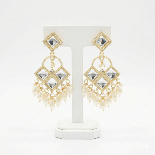 Close-up view of premium artificial Traditional Geometric Kundan & Pearl Drop Dangler Earrings by Innovate Art Impex.