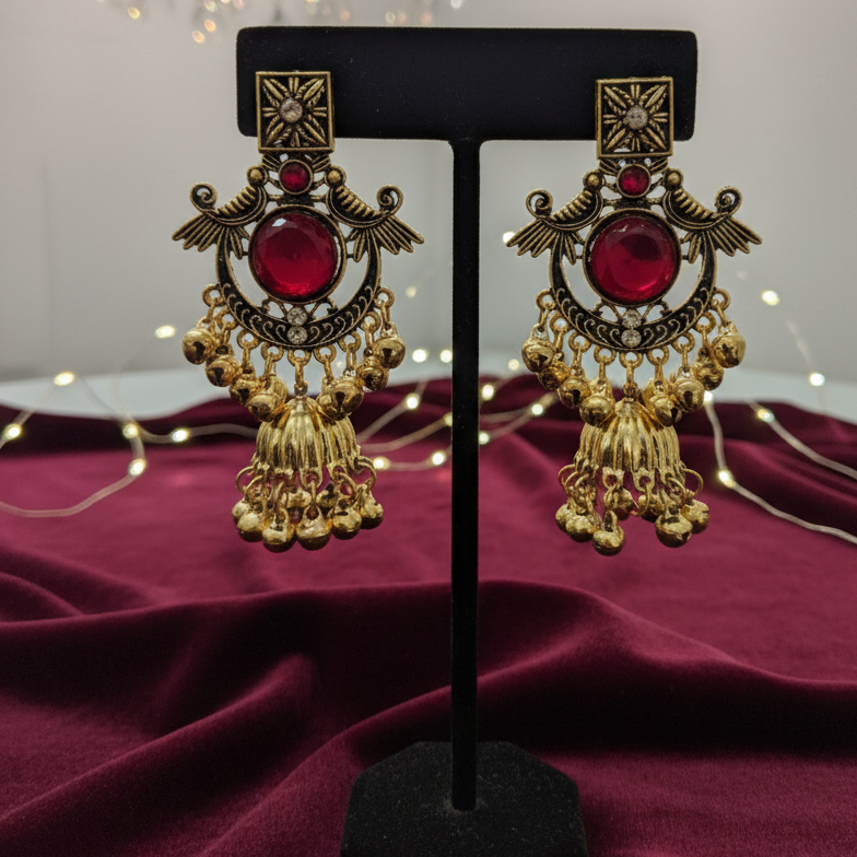 Close-up view of premium artificial Royal Ruby Red & Antique Gold Chandbali Jhumka Earrings by Innovate Art Impex.