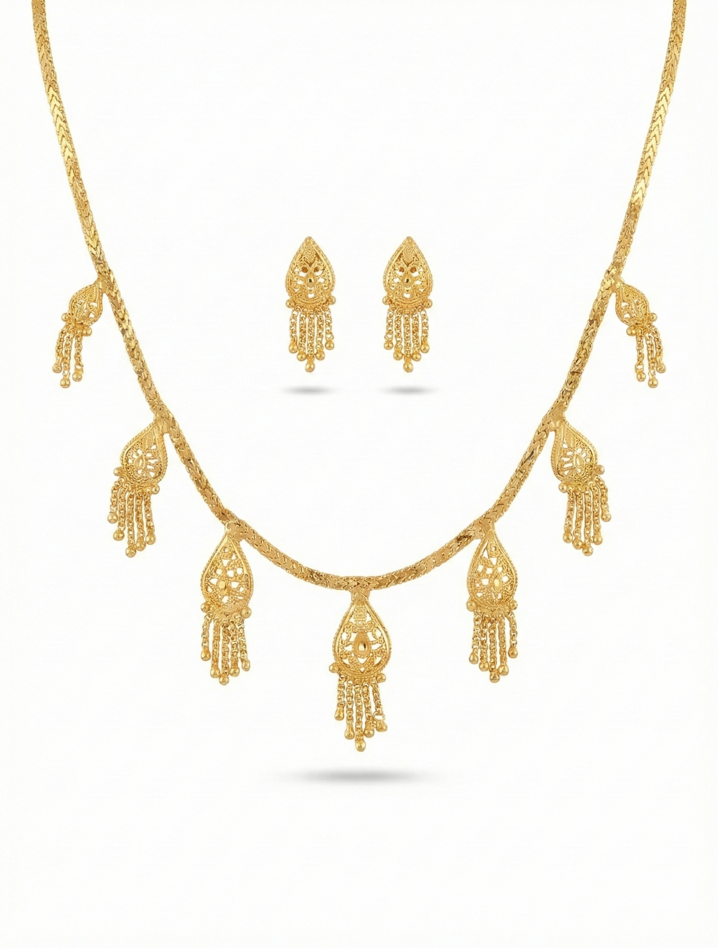 Close-up view of premium artificial Innovate Art Impex Gold Finished Filigree Teardrop Necklace with Jhumka Style Dangle Earrings Ethnic Wedding Party Jwellery for Saree, Lehenga & Girls Dresses by Innovate Art Impex.