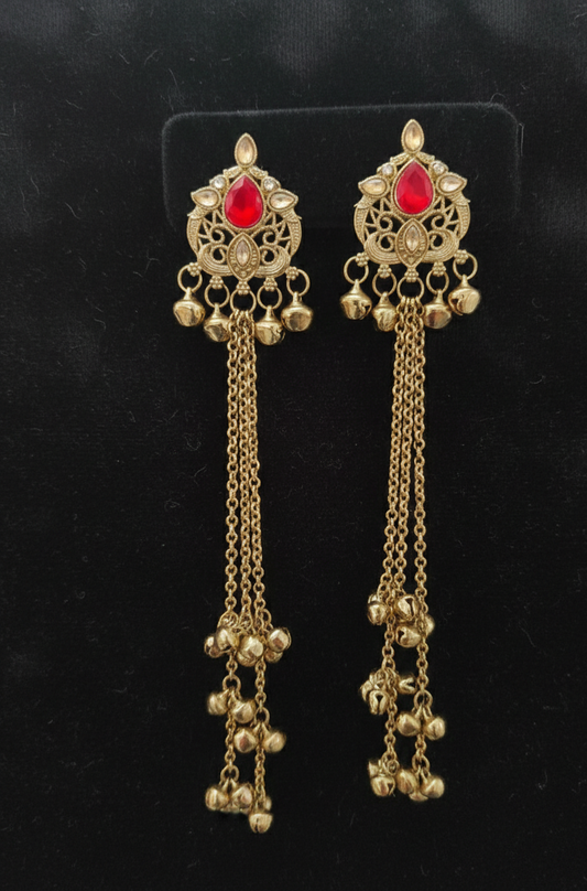 Close-up view of premium artificial Royal Red Stone Gold Plated Long Tassel Earrings with Cascading Ghungroo Bells by Innovate Art Impex.