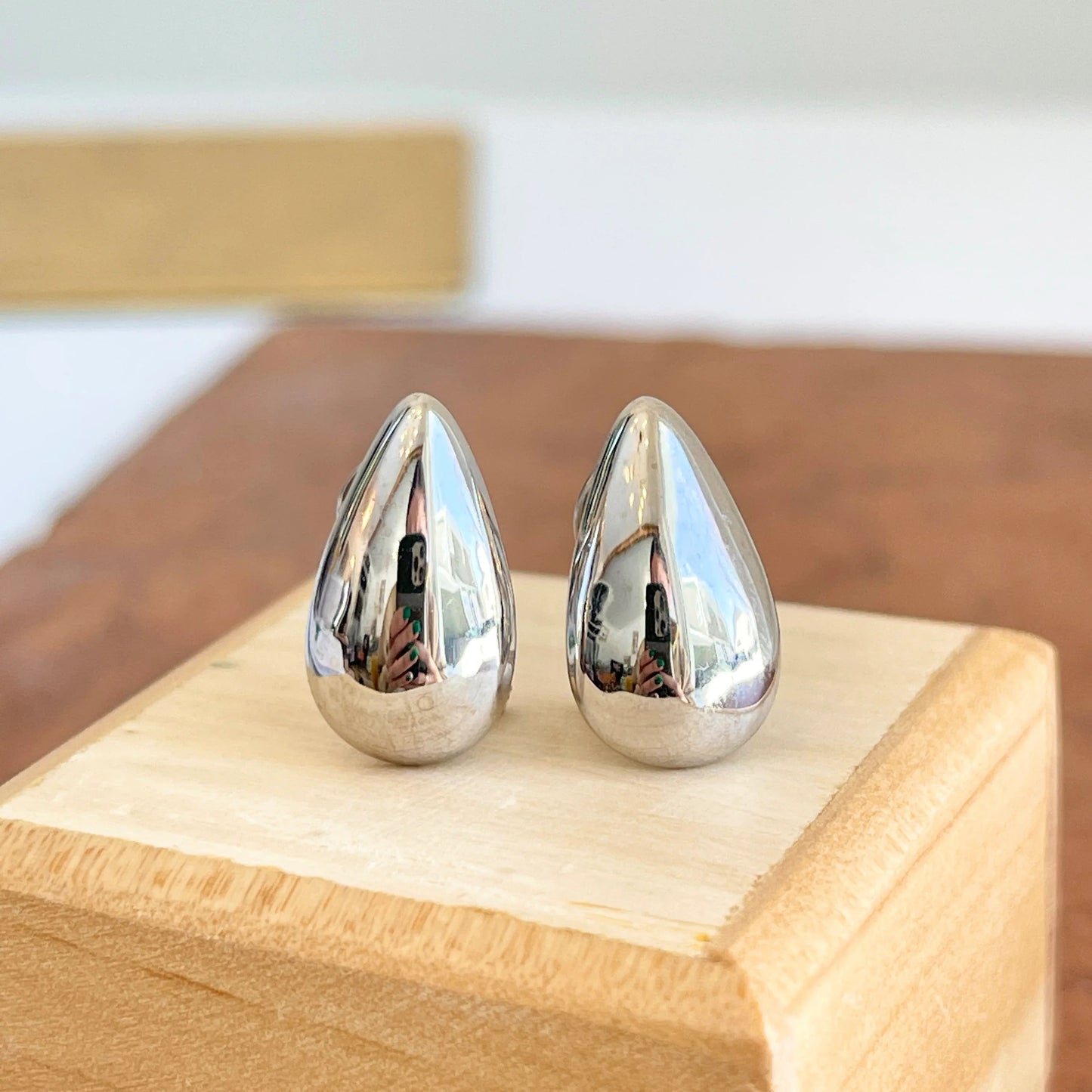 Close-up view of premium artificial Silver Plated Teardrop Stud Earrings for Women | Minimalist Daily Wear Earrings by Innovate Art Impex.