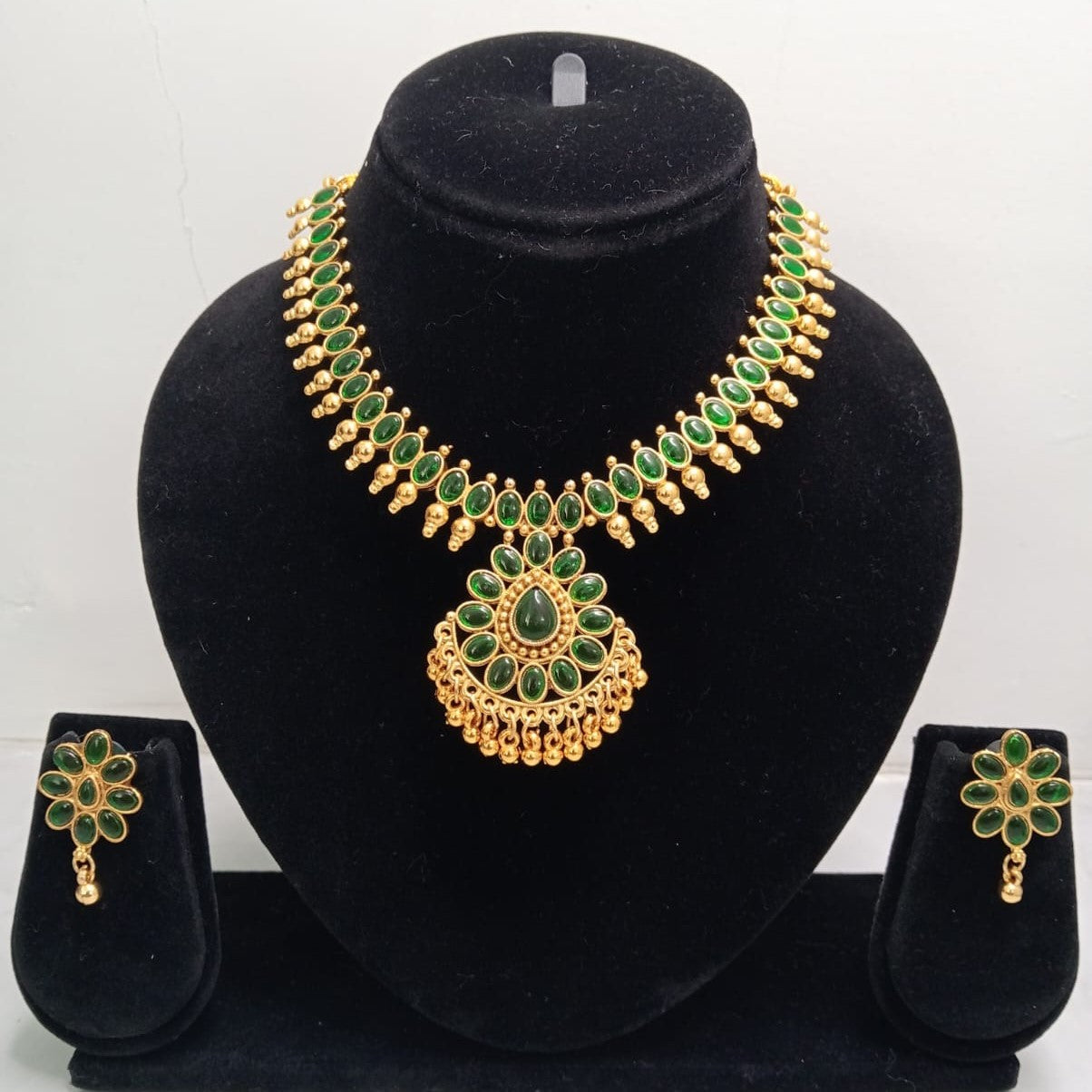 Close-up view of premium artificial Gold Plated Green Stone Traditional Necklace Set with Matching Earrings for Women by Innovate Art Impex.