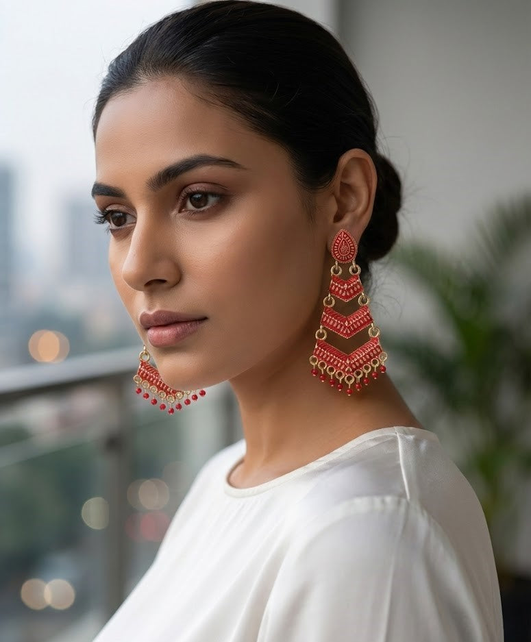 Close-up view of premium artificial Red Meenakari Gold Plated Layered Drop Earrings with Pearl Hanging by Innovate Art Impex.