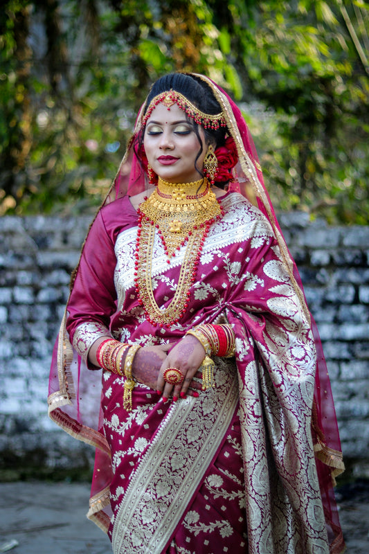 A bride in a traditional indian wedding outfit