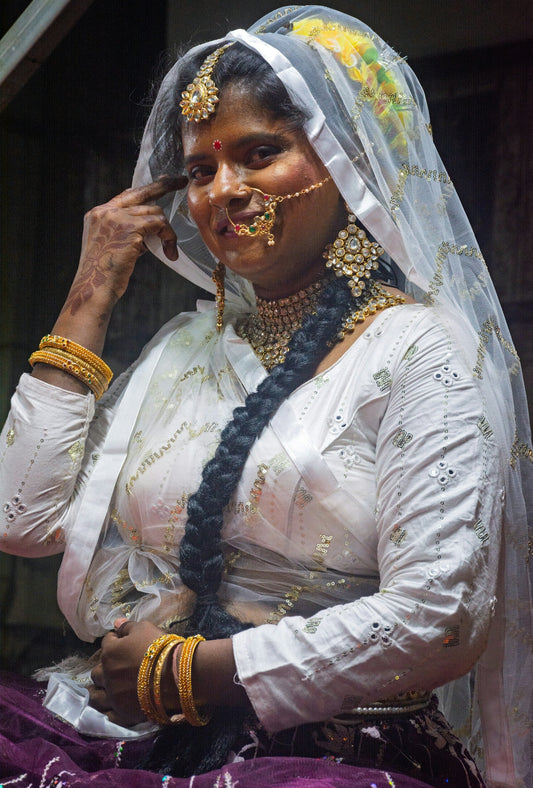 A woman in traditional indian wedding attire
