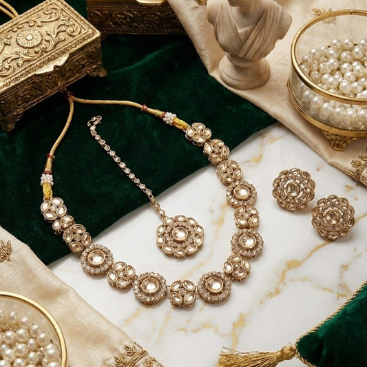 Close-up view of premium artificial Innovate Art Impex Traditional Gold Plated Kundan Style Choker Necklace Set with Matching Earrings and Maang Tikka for Women | Cubic Zirconia CZ Stones Ethnic Indian Fashion Jewellery | Lightweight Alloy Statement Accessories for Traditional Occasions by Innovate Art Impex.