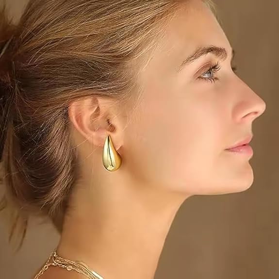 Close-up view of premium artificial 2 Pairs Combo Celebrity Inspired Stylish Gold Silver Plated Teardrop Earrings Dupes for Women Girls Teenagers Trending Oversized Lightweight Statement Waterdrop Earrings by Innovate Art Impex.