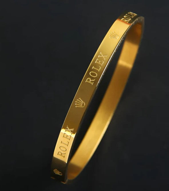 Close-up view of premium artificial Premium Gold-Plated Crown Engraved Bangle | Minimalist Designer Cuff Bracelet for Men & Women by Innovate Art Impex.