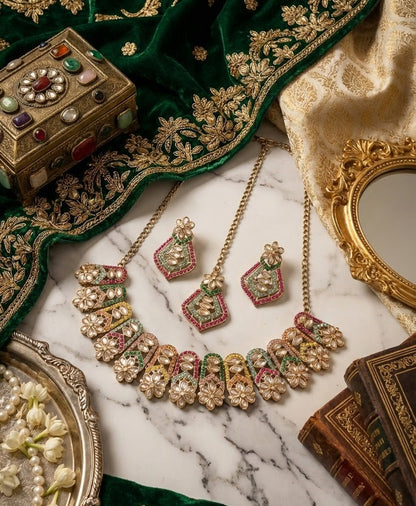 Close-up view of premium artificial Gold Toned Multi Color Geometric Mosaic Kundan Necklace Set Gold Plated Multi Color Floral Halo Necklace Set with Maang Tikka by Innovate Art Impex.