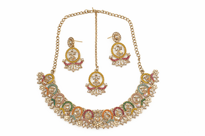 Close-up view of premium artificial Antique Gold Multi Color Stone Jewelry Set with Crescent Earrings & Maang Tikka by Innovate Art Impex.