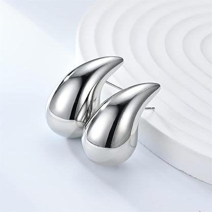 Close-up view of premium artificial Silver Plated Teardrop Stud Earrings for Women | Minimalist Daily Wear Earrings by Innovate Art Impex.