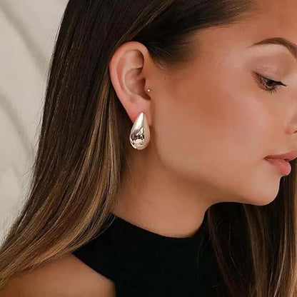 Close-up view of premium artificial 2 Pairs Combo Celebrity Inspired Stylish Gold Silver Plated Teardrop Earrings Dupes for Women Girls Teenagers Trending Oversized Lightweight Statement Waterdrop Earrings by Innovate Art Impex.