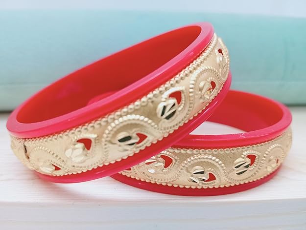 Close-up view of premium artificial Innovate Art Impex Traditional Bengali Red Pala Bangles for Women - Set of 2 | Gold Plated Leaf Textured Brass Alloy Bangles | Ethnic Shakha Pola Style Jewelry for Weddings, Festivals & Daily Use by Innovate Art Impex.