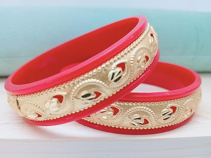 Close-up view of premium artificial Innovate Art Impex Traditional Bengali Red Pala Bangles for Women - Set of 2 | Gold Plated Leaf Textured Brass Alloy Bangles | Ethnic Shakha Pola Style Jewelry for Weddings, Festivals & Daily Use by Innovate Art Impex.