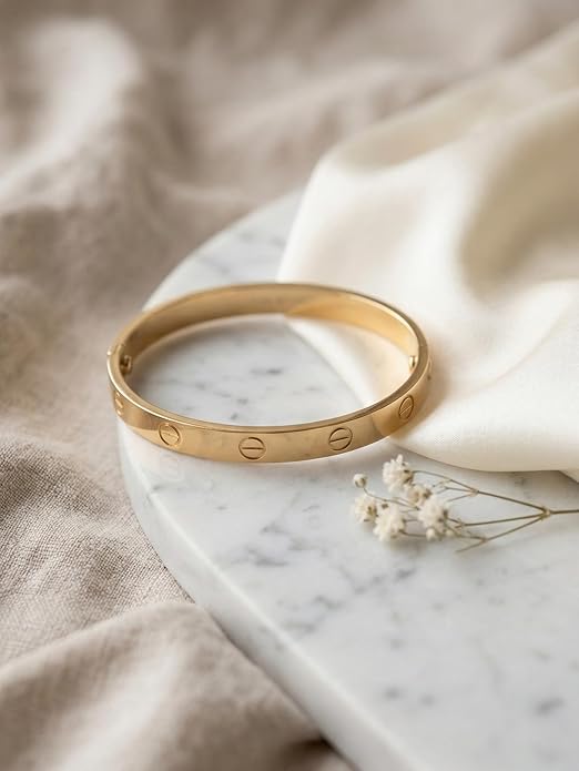 Close-up view of premium artificial Innovate Art Impex Women's Stylish Gold-Plated Screw Design Bracelet - Iconic Minimalist Bangle - High-Metal Imitation Jewellery - Free Size with Side Lock Closure by Innovate Art Impex.