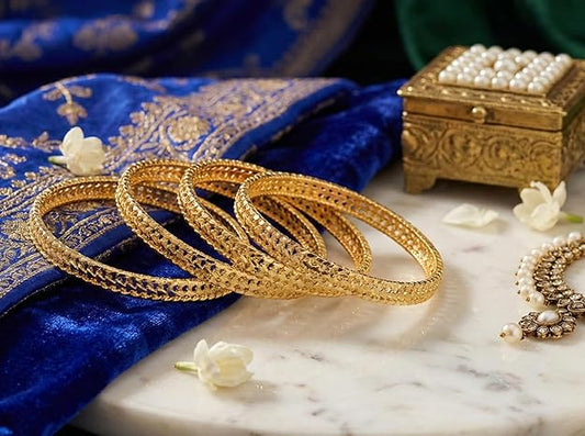 Close-up view of premium artificial Innovate Art Impex Traditional Bengali Gold Tone Alloy Bangles Set of 4 for Women | Ethnic Indian Chudi Kada Jewelry for Girls | Bridal & Wedding Accessories | Daily Bangle Bracelet Pack by Innovate Art Impex.