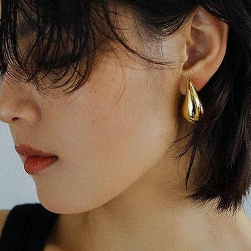 Close-up view of premium artificial Gold Plated Teardrop Stud Earrings for Women | Minimalist Daily Wear Earrings by Innovate Art Impex.
