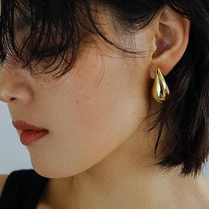 Close-up view of premium artificial Gold Plated Teardrop Stud Earrings for Women | Minimalist Daily Wear Earrings by Innovate Art Impex.