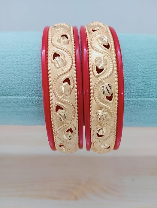 Close-up view of premium artificial Innovate Art Impex Traditional Bengali Red Pala Bangles for Women - Set of 2 | Gold Plated Leaf Textured Brass Alloy Bangles | Ethnic Shakha Pola Style Jewelry for Weddings, Festivals & Daily Use by Innovate Art Impex.
