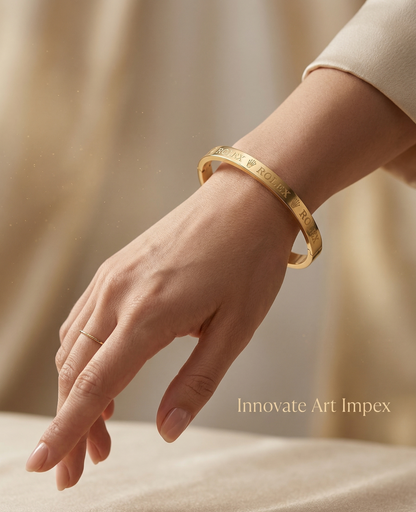 Close-up view of premium artificial Premium Gold-Plated Crown Engraved Bangle | Minimalist Designer Cuff Bracelet for Men & Women by Innovate Art Impex.