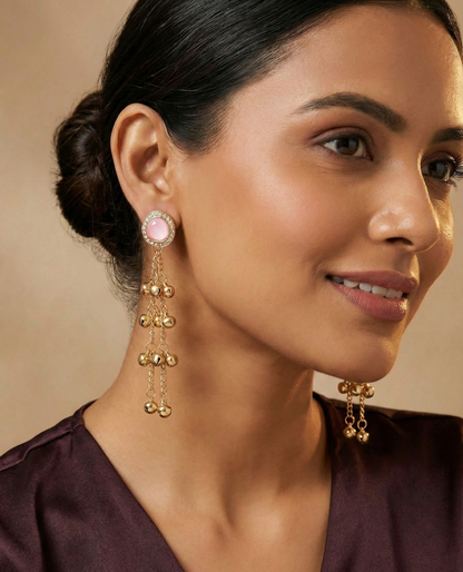 Close-up view of premium artificial Blush Pink Stone & Gold Ghungroo Tassel Statement Earrings Gold Plated Kundan Drop Earrings – Traditional Fusion Long Chain Hangings for Women & Girls by Innovate Art Impex.
