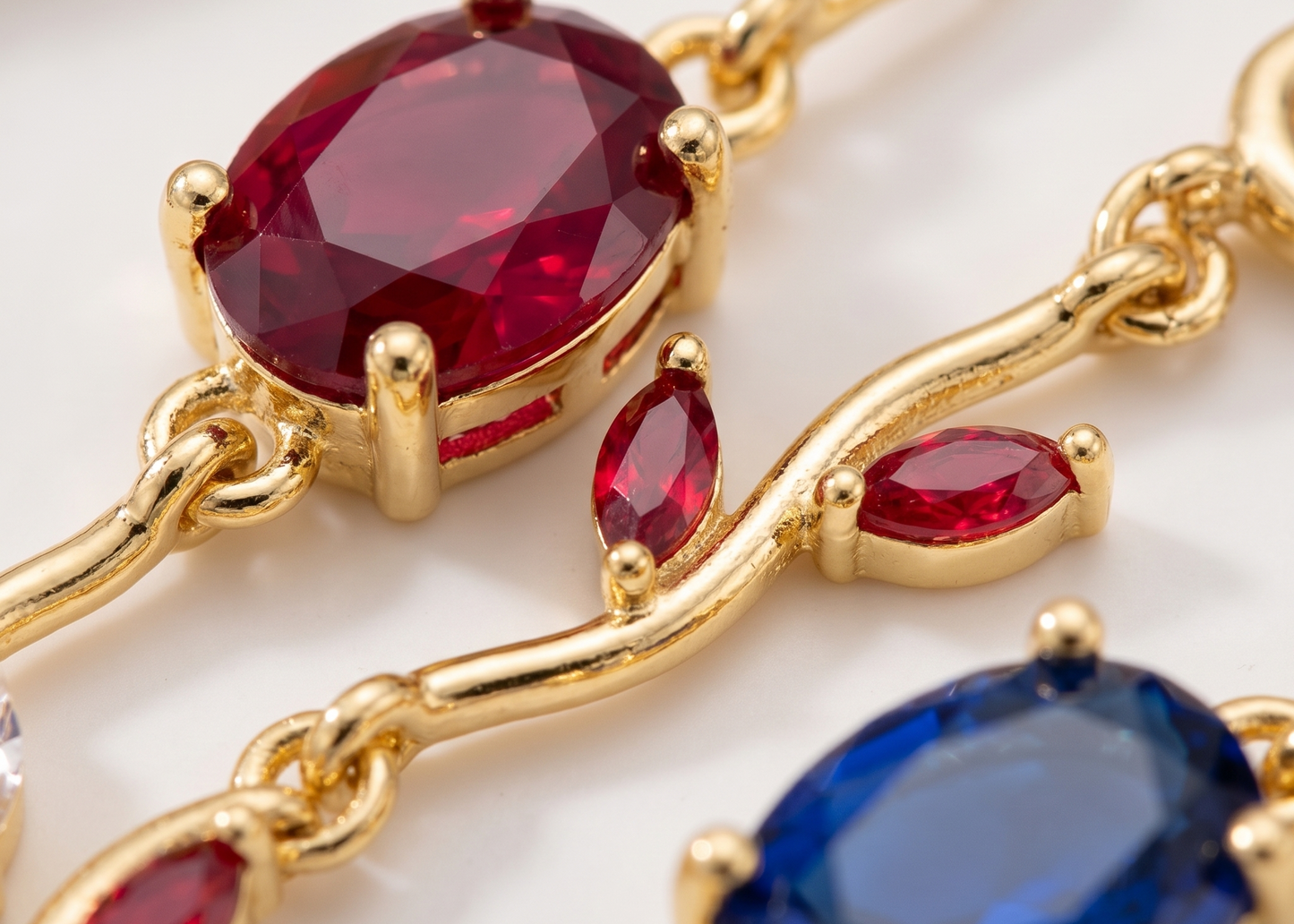 Rainbow Vine Multi-Gemstone Bracelet - Gold Plated Botanical Leaf Link Design with Oval Ruby, Sapphire, Emerald, Amethyst & Citrine
