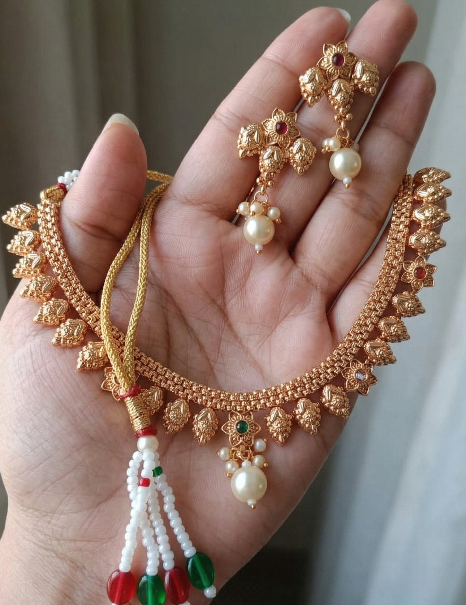 Close-up view of premium artificial Traditional Matte Gold Plated Temple Jewellery Necklace Set with Earrings for Women by Innovate Art Impex.