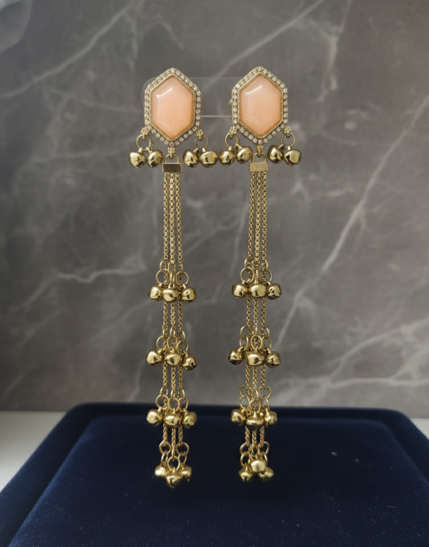Close-up view of premium artificial Peach Hexagonal Stone Gold Tassel Drop Earrings   Elegant Statement Jewelry by Innovate Art Impex.