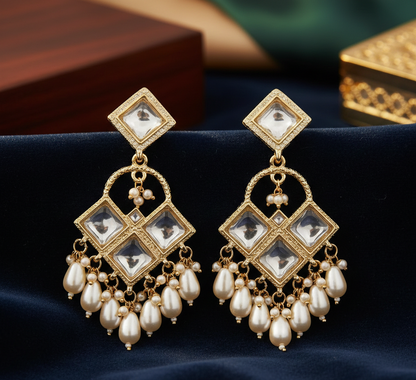 Close-up view of premium artificial Traditional Geometric Kundan & Pearl Drop Dangler Earrings by Innovate Art Impex.