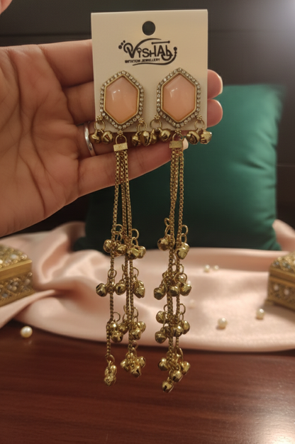 Close-up view of premium artificial Peach Hexagonal Stone Gold Tassel Drop Earrings   Elegant Statement Jewelry by Innovate Art Impex.