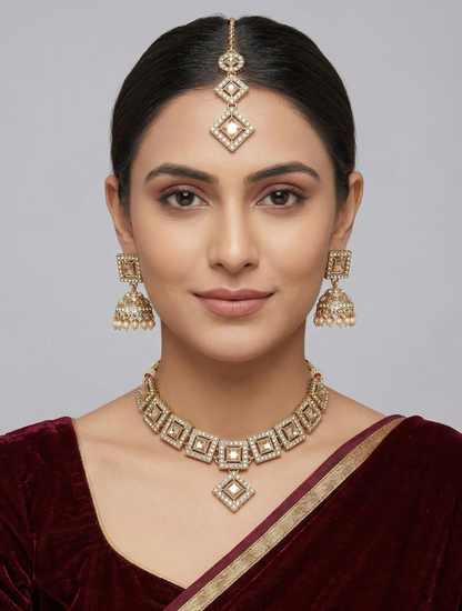 Close-up view of premium artificial Royal Antique Gold Chandbali Jhumka Earrings for Women | Premium Traditional Ethnic Jewellery | Wedding, Festive & Party Wear by Innovate Art Impex.