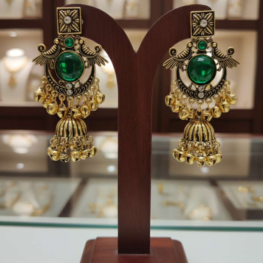 Close-up view of premium artificial Royal Emerald Green & Gold Jhumka Earrings   Antique Finish by Innovate Art Impex.