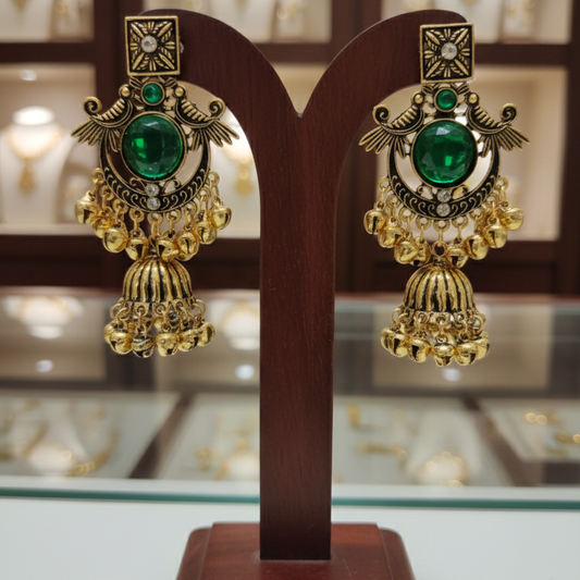 Close-up view of premium artificial Royal Emerald Green & Gold Jhumka Earrings   Antique Finish by Innovate Art Impex.