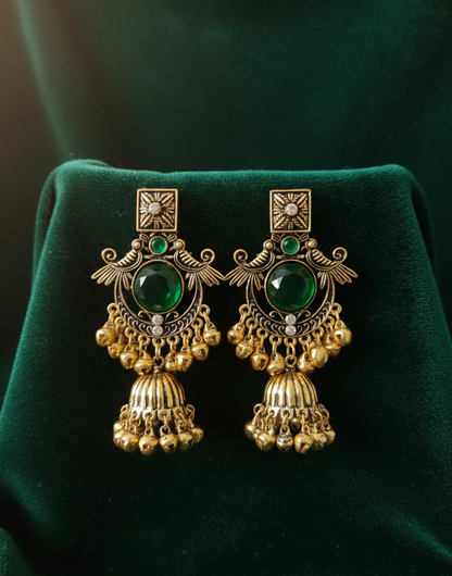 Close-up view of premium artificial Royal Emerald Green & Gold Jhumka Earrings   Antique Finish by Innovate Art Impex.