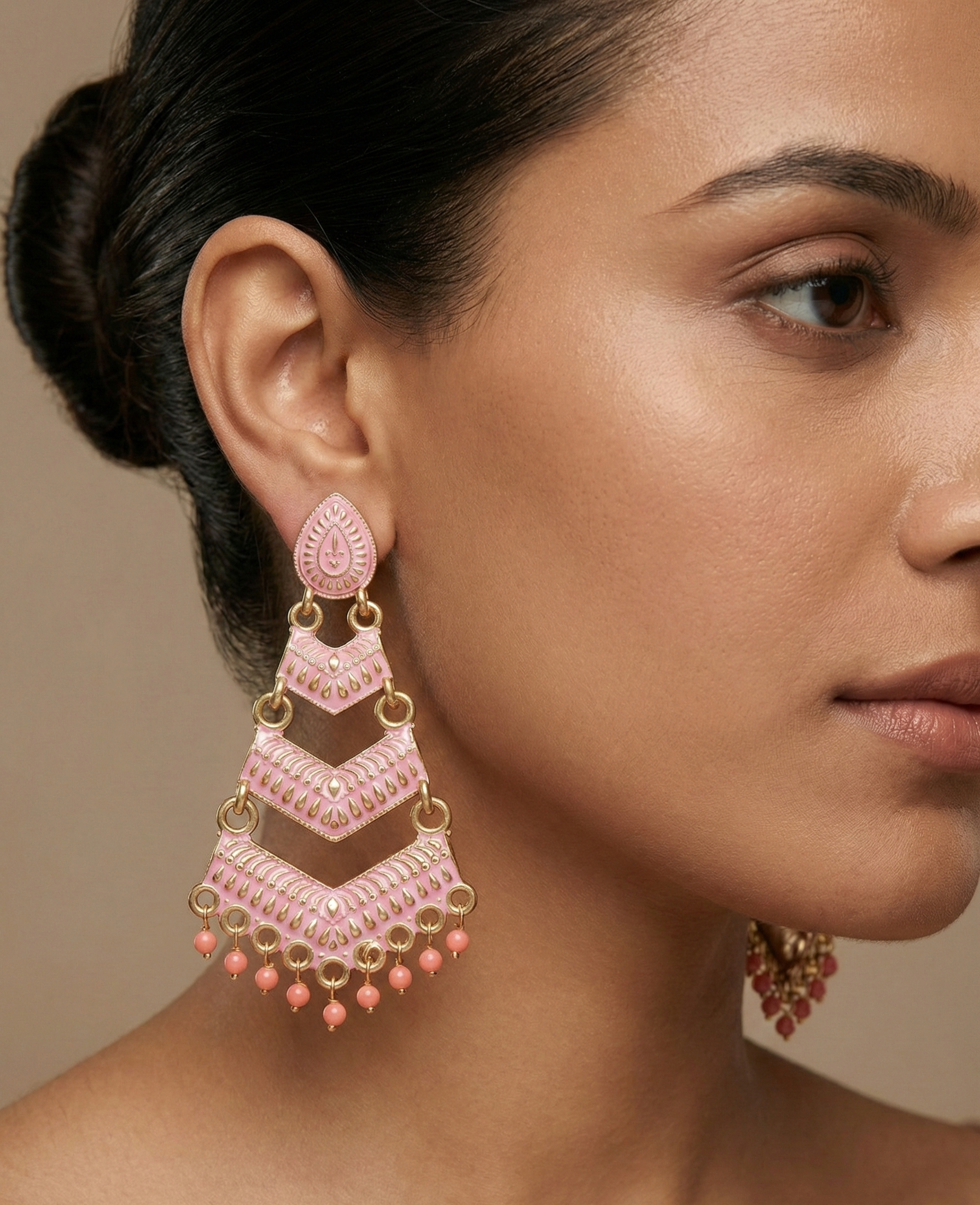 Close-up view of premium artificial Pink Meenakari Gold Plated Layered Drop Earrings with Pearl Hanging by Innovate Art Impex.