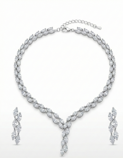 Close-up view of premium artificial Silver plated American Diamond marquise necklace and earring set on white by Innovate Art Impex.