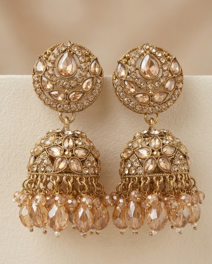 Close-up view of premium artificial Antique Gold Floral Leaf Design Jhumki Earrings with Handcrafted Bead Drops. by Innovate Art Impex.