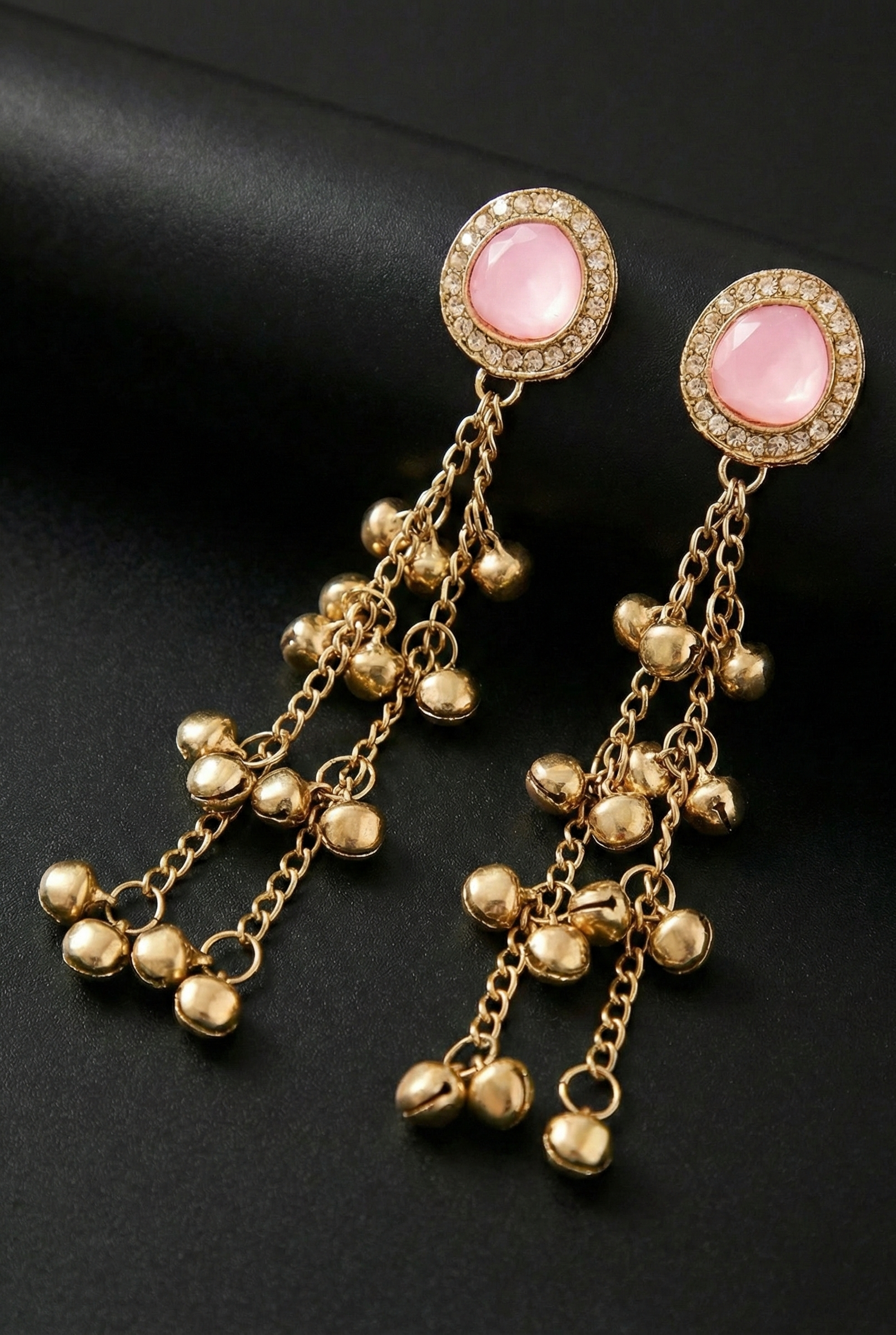 Close-up view of premium artificial Blush Pink Stone & Gold Ghungroo Tassel Statement Earrings Gold Plated Kundan Drop Earrings – Traditional Fusion Long Chain Hangings for Women & Girls by Innovate Art Impex.