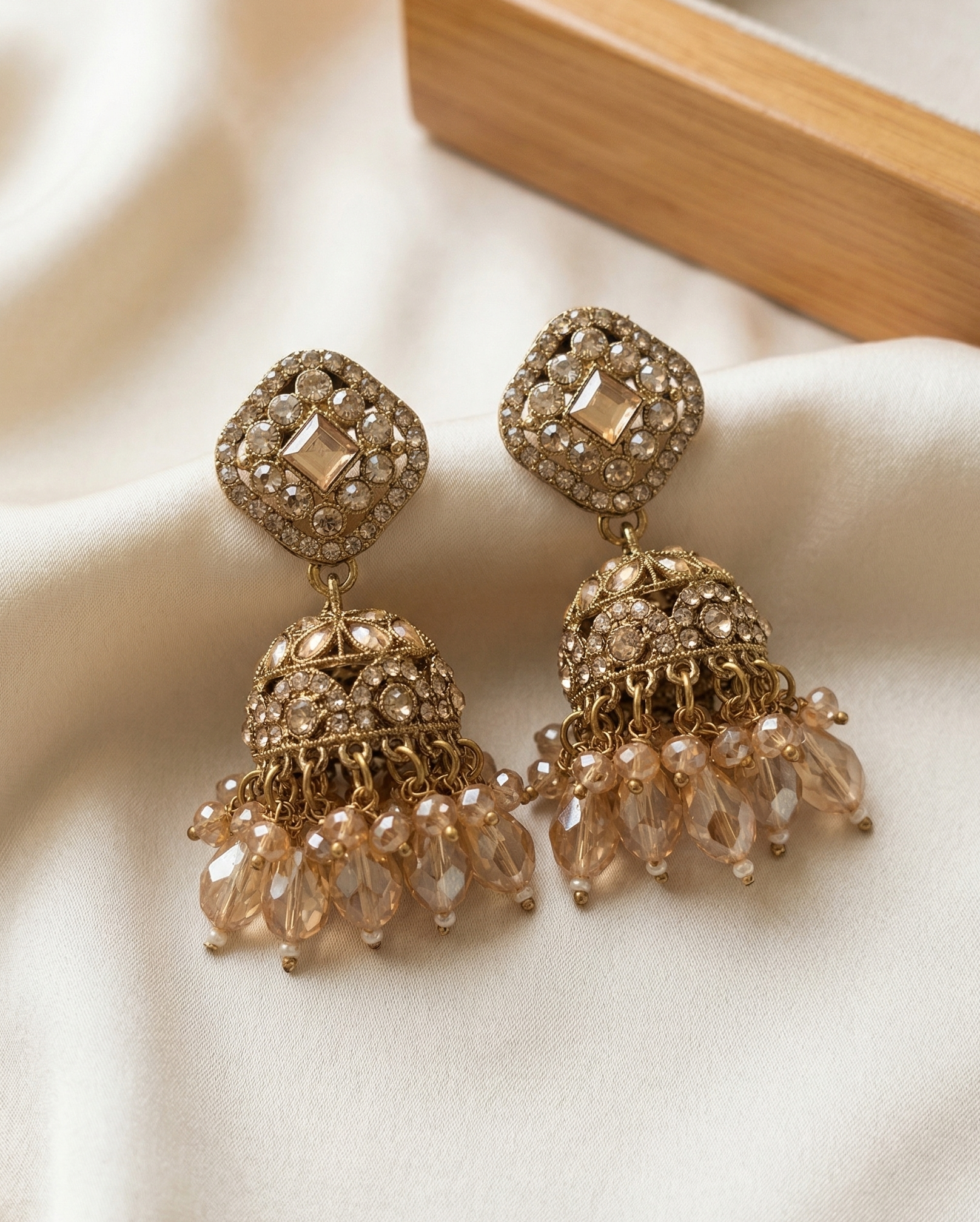 Close-up view of premium artificial Elegant Square-Shaped Kundan Studded Jhumka Earrings for Party and Festive Wear. by Innovate Art Impex.