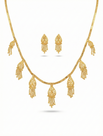 Close-up view of premium artificial Innovate Art Impex Gold Finished Filigree Teardrop Necklace with Jhumka Style Dangle Earrings   Ethnic Wedding Party Jwellery for Saree, Lehenga & Girls Dresses by Innovate Art Impex.