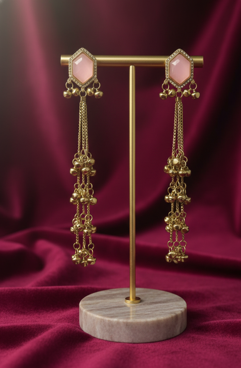 Close-up view of premium artificial Pink Hexagonal Stone Gold Tassel Drop Earrings   Elegant Statement Jewelry by Innovate Art Impex.