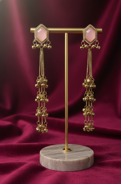 Close-up view of premium artificial Pink Hexagonal Stone Gold Tassel Drop Earrings   Elegant Statement Jewelry by Innovate Art Impex.
