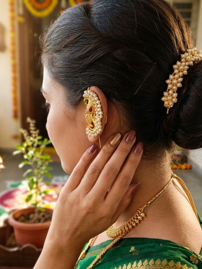 INNOVATE ART IMPEX intricate peacock motif earrings with ruby accents
