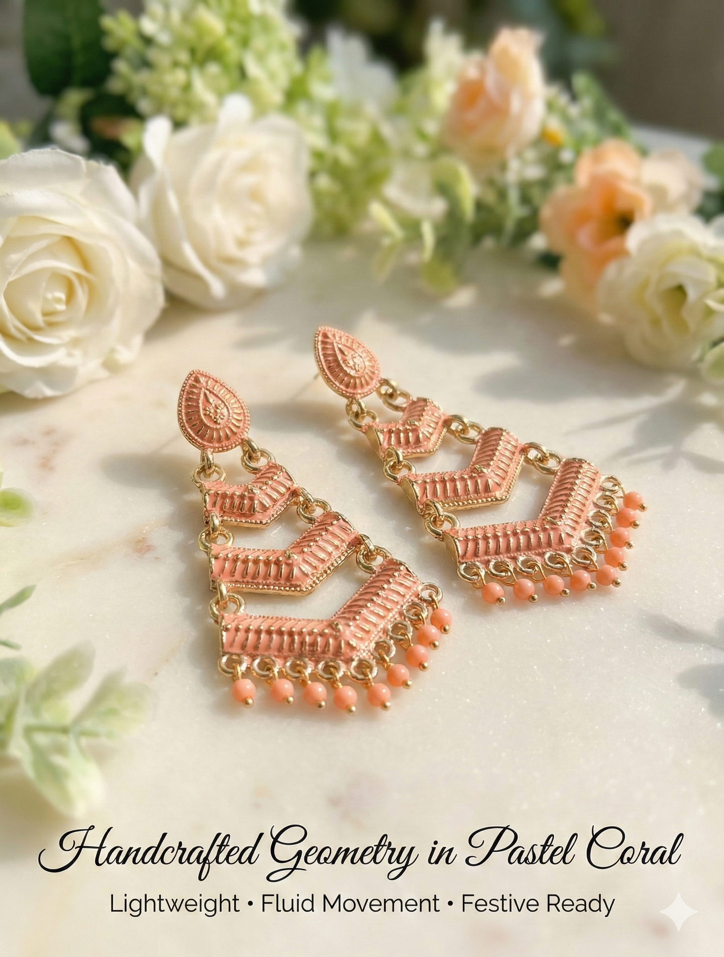 Close-up view of premium artificial Orange Meenakari Gold Plated Layered Drop Earrings with Pearl Hanging by Innovate Art Impex.