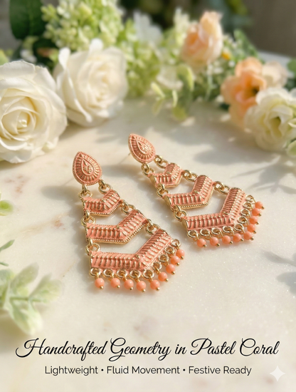 Close-up view of premium artificial Orange Meenakari Gold Plated Layered Drop Earrings with Pearl Hanging by Innovate Art Impex.