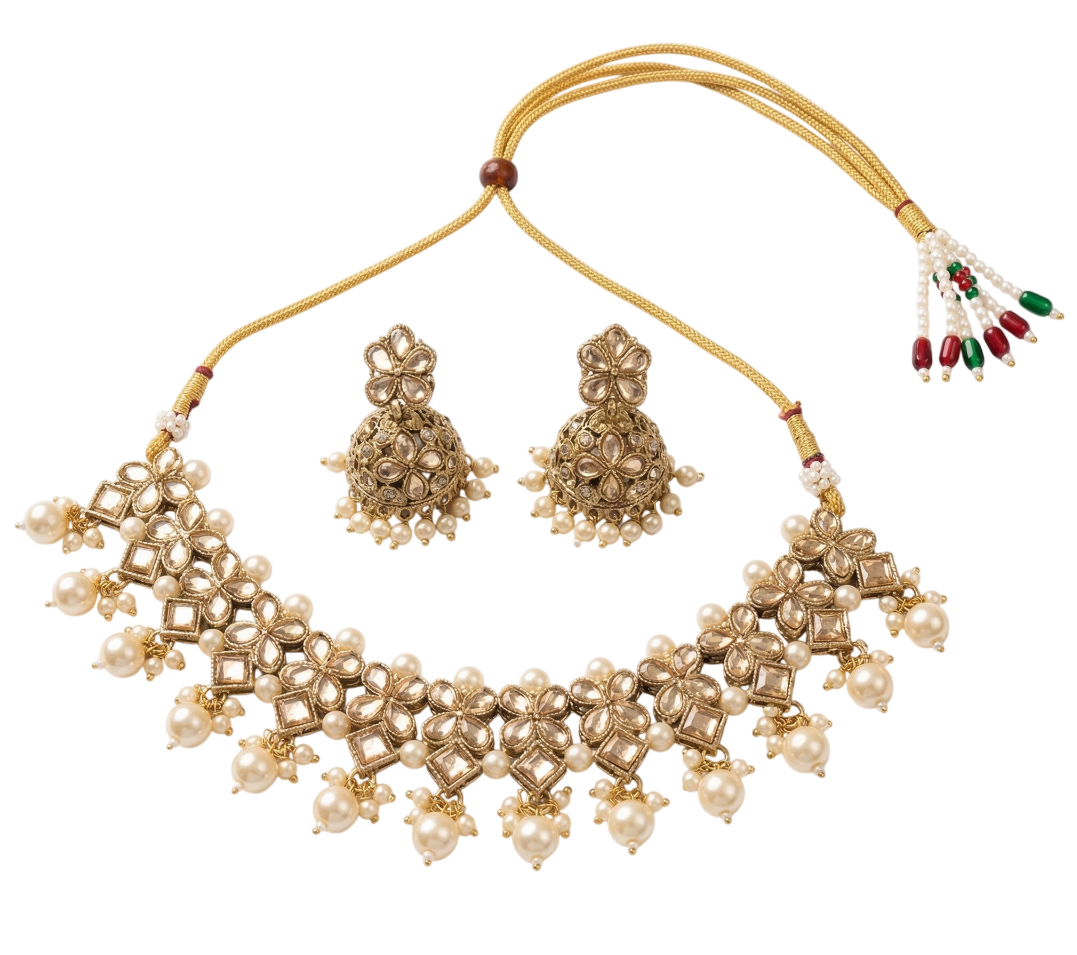 Close-up view of premium artificial Antique Gold Kundan Choker Set with Pearl Drops & Matching Jhumka Earrings by Innovate Art Impex.