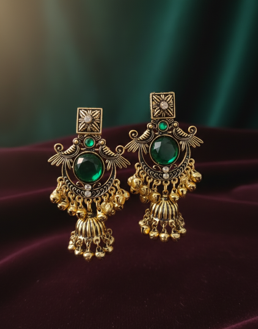 Close-up view of premium artificial Royal Emerald Green & Gold Jhumka Earrings   Antique Finish by Innovate Art Impex.