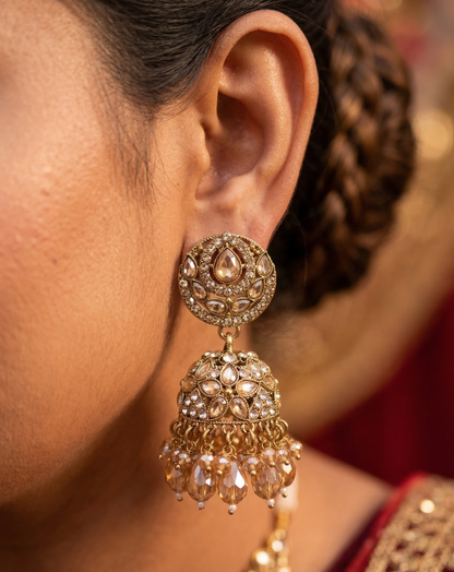 Close-up view of premium artificial Antique Gold Floral Leaf Design Jhumki Earrings with Handcrafted Bead Drops. by Innovate Art Impex.