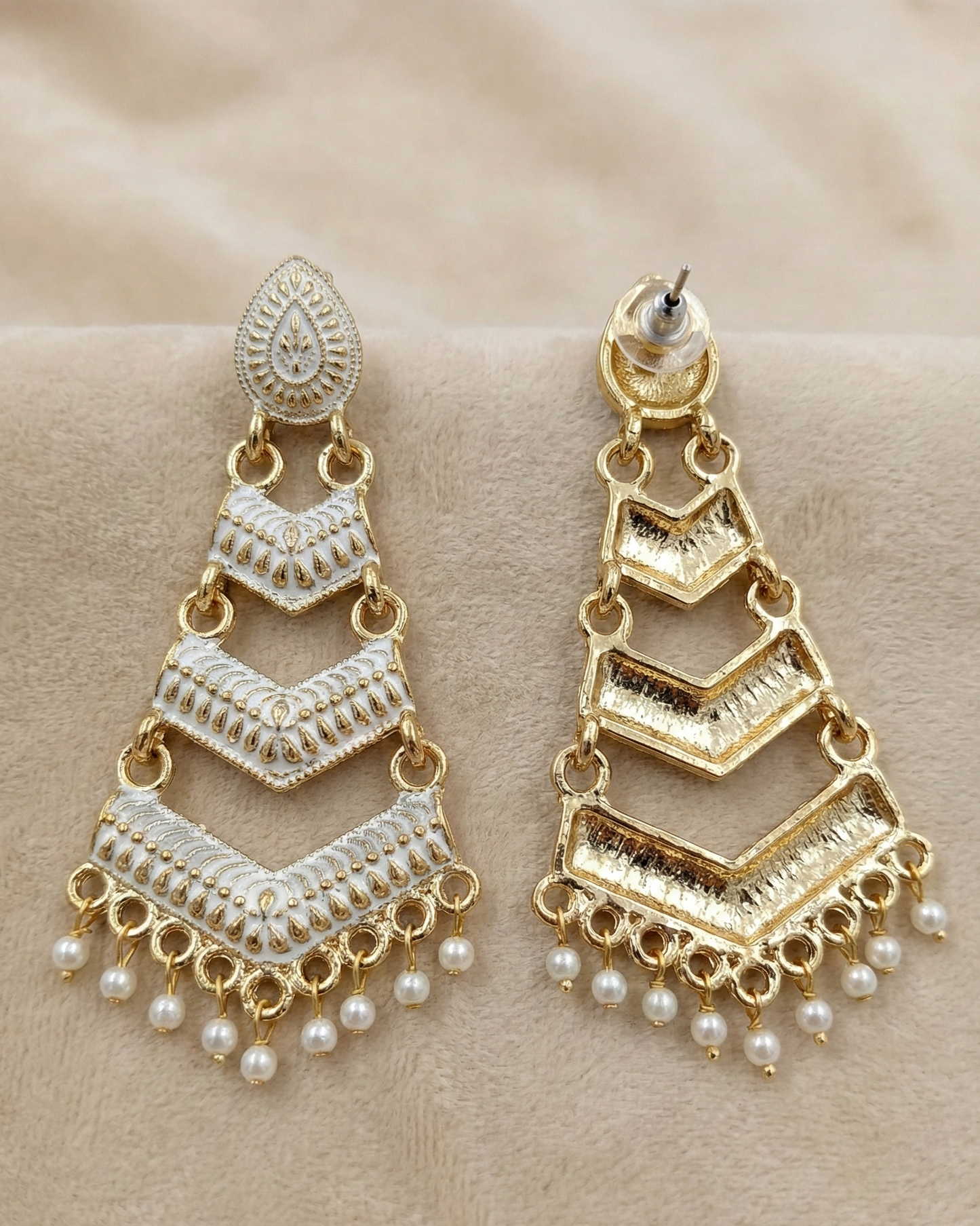 Close-up view of premium artificial White Meenakari Gold Plated Layered Drop Earrings with Pearl Hanging by Innovate Art Impex.