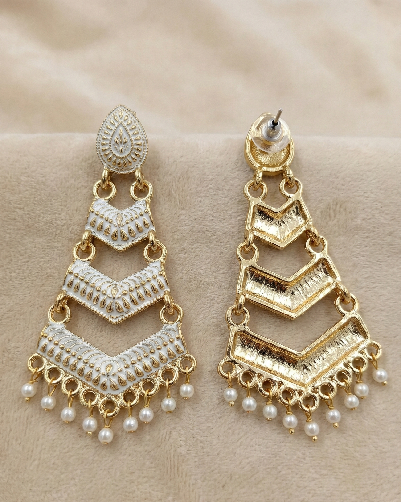 Close-up view of premium artificial White Meenakari Gold Plated Layered Drop Earrings with Pearl Hanging by Innovate Art Impex.